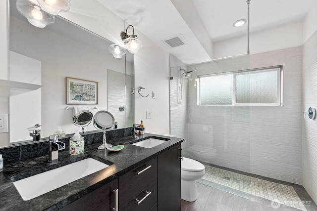 11017 Forest Ave S, Seattle, WA 98178 - bathroom with double vanity, a walk in shower, and tile patterned floors