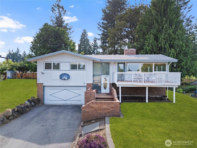 29929 4th Ave SW, Federal Way, WA 98023 - view of front of property with driveway, a front yard, a chimney, and an attached garage