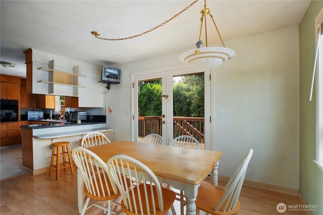 29929 4th Ave SW, Federal Way, WA 98023 - dining room featuring light wood finished floors and french doors