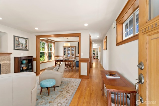 4415 40th Ave SW, Seattle, WA 98116 - living area with light wood-type flooring, wainscoting, and recessed lighting