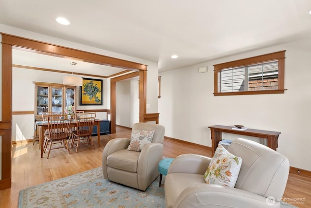4415 40th Ave SW, Seattle, WA 98116 - living area featuring wood finished floors and recessed lighting
