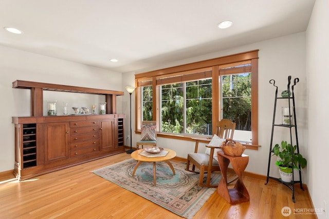 4415 40th Ave SW, Seattle, WA 98116 - sitting room with light wood-style floors, a dry bar, recessed lighting, and beverage cooler