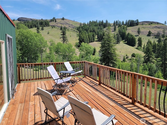 466 Sqove Rd, Wauconda, WA 98859 - wooden terrace featuring a mountain view