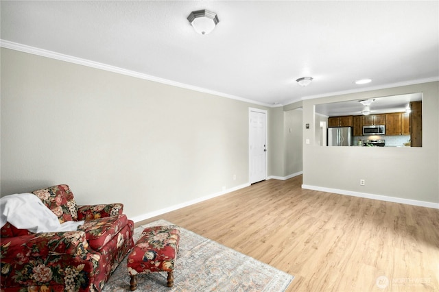 889 SW Kingma Ct, Oak Harbor, WA 98277 - living area featuring crown molding and light wood finished floors
