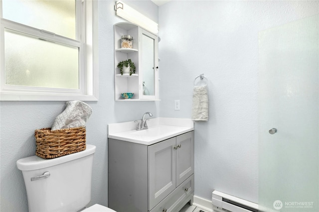 889 SW Kingma Ct, Oak Harbor, WA 98277 - bathroom with a baseboard heating unit and vanity