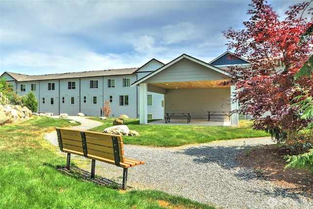 2014 101st Ave SE Unit 6, Lake Stevens, WA 98258 - rear view of house featuring a yard and a patio area