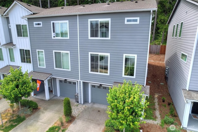 2014 101st Ave SE Unit 6, Lake Stevens, WA 98258 - view of front of house featuring an attached garage and concrete driveway