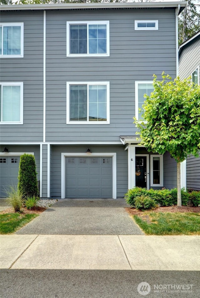 2014 101st Ave SE Unit 6, Lake Stevens, WA 98258 - townhome / multi-family property with asphalt driveway and a garage