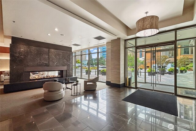10650 NE 9th Pl Unit 3208, Bellevue, WA 98004 - common area with floor to ceiling windows and recessed lighting