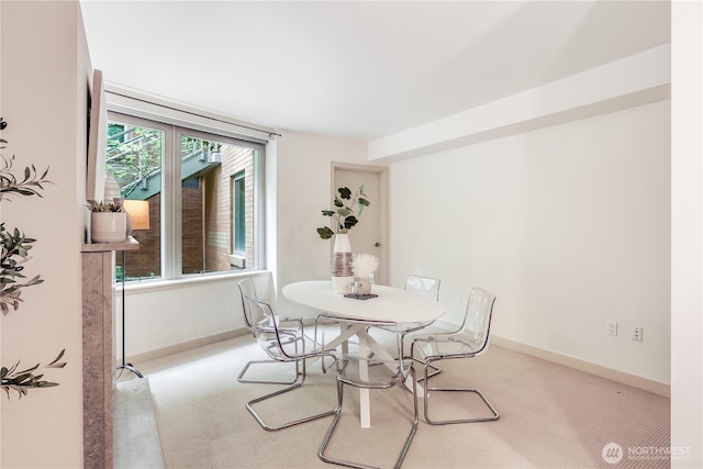 10650 NE 9th Pl Unit 3208, Bellevue, WA 98004 - dining space with carpet and baseboards