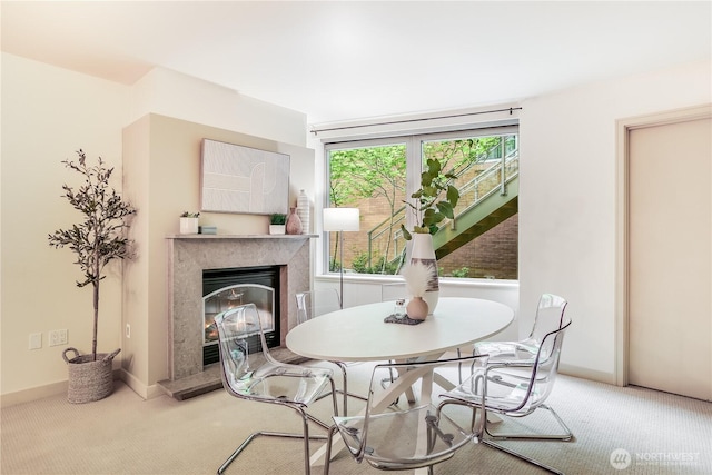 10650 NE 9th Pl Unit 3208, Bellevue, WA 98004 - dining room with carpet and a high end fireplace