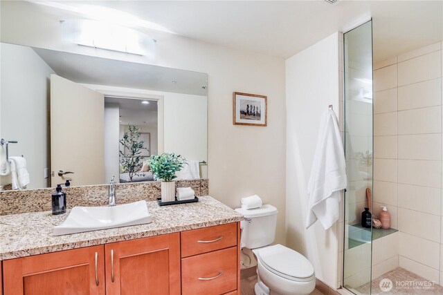 10650 NE 9th Pl Unit 3208, Bellevue, WA 98004 - bathroom featuring vanity and a stall shower