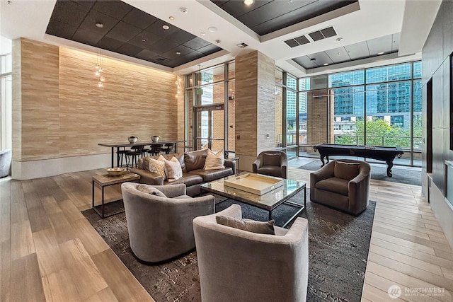 10650 NE 9th Pl Unit 3208, Bellevue, WA 98004 - common area featuring a high ceiling, expansive windows, and recessed lighting
