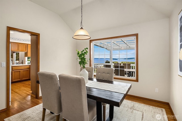 1021 N Sunset Dr, Camano Island, WA 98282 - dining room featuring wood finished floors and lofted ceiling