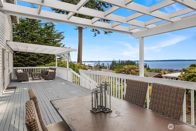 1021 N Sunset Dr, Camano Island, WA 98282 - wooden terrace with an outdoor hangout area, a water view, and a pergola