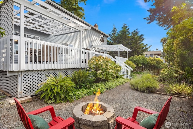 1021 N Sunset Dr, Camano Island, WA 98282 - view of yard featuring a fire pit, a pergola, and a deck