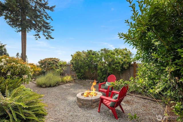 1021 N Sunset Dr, Camano Island, WA 98282 - view of patio / terrace with an outdoor fire pit