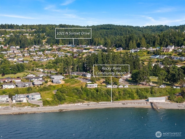 1021 N Sunset Dr, Camano Island, WA 98282 - aerial view of residential area featuring a large body of water and property parcel outlined
