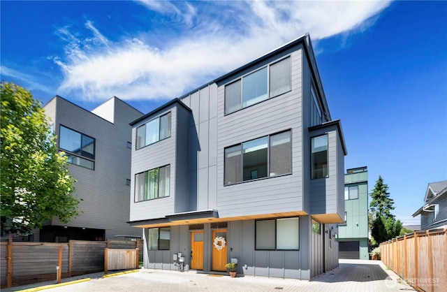 2620 NW 62nd St Unit B, Seattle, WA 98107 - modern home featuring board and batten siding