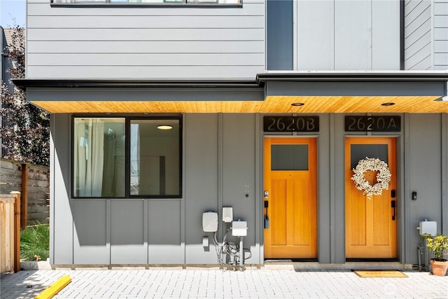 2620 NW 62nd St Unit B, Seattle, WA 98107 - doorway to property with covered porch and uncovered parking