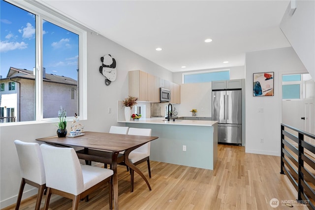 2620 NW 62nd St Unit B, Seattle, WA 98107 - dining room with light wood-style flooring and recessed lighting