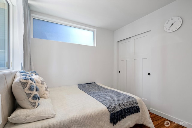 2620 NW 62nd St Unit B, Seattle, WA 98107 - bedroom featuring wood finished floors and a closet