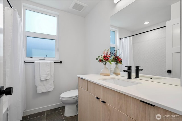 2620 NW 62nd St Unit B, Seattle, WA 98107 - full bathroom featuring vanity, tile patterned floors, and shower / bath combo