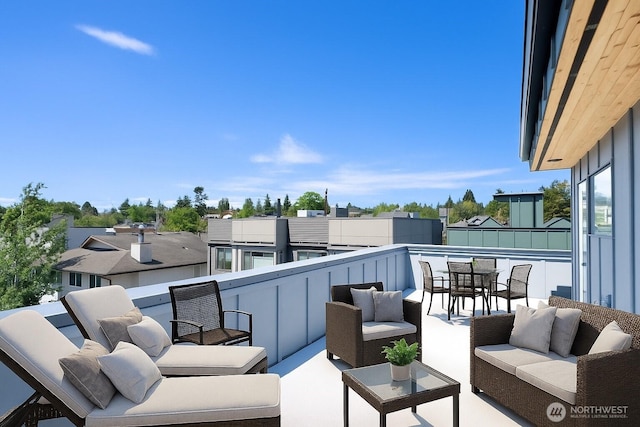 2620 NW 62nd St Unit B, Seattle, WA 98107 - balcony featuring an outdoor living space