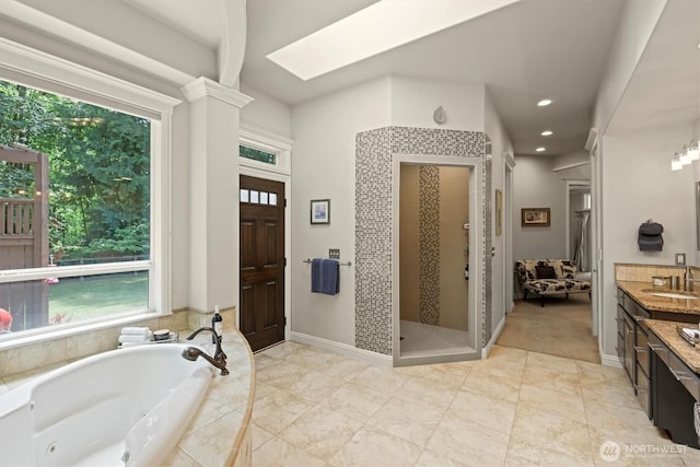 3303 Gravelly Beach Loop NW, Olympia, WA 98502 - bathroom featuring healthy amount of natural light, a whirlpool tub, vanity, a stall shower, and recessed lighting