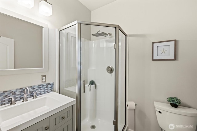 3303 Gravelly Beach Loop NW, Olympia, WA 98502 - full bathroom featuring vanity, a shower stall, and tasteful backsplash