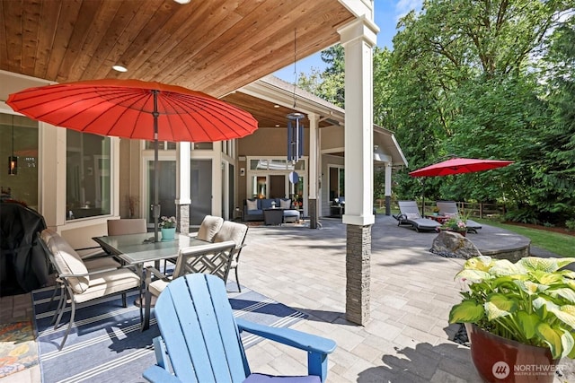 3303 Gravelly Beach Loop NW, Olympia, WA 98502 - view of patio featuring outdoor dining space and an outdoor living space