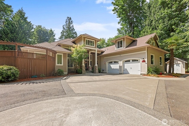 3303 Gravelly Beach Loop NW, Olympia, WA 98502 - view of front facade featuring an attached garage and concrete driveway