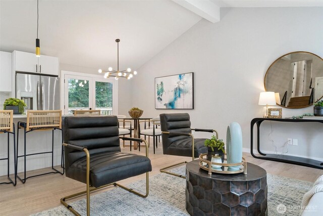 12804 NE 139th Ct, Kirkland, WA 98034 - living area with light wood-type flooring, a chandelier, beamed ceiling, and high vaulted ceiling