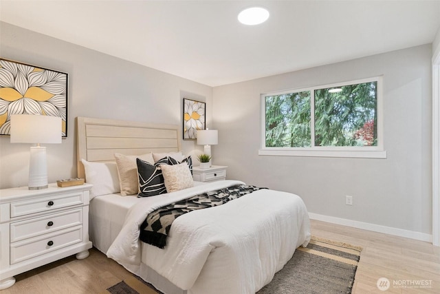 12804 NE 139th Ct, Kirkland, WA 98034 - bedroom with light wood finished floors