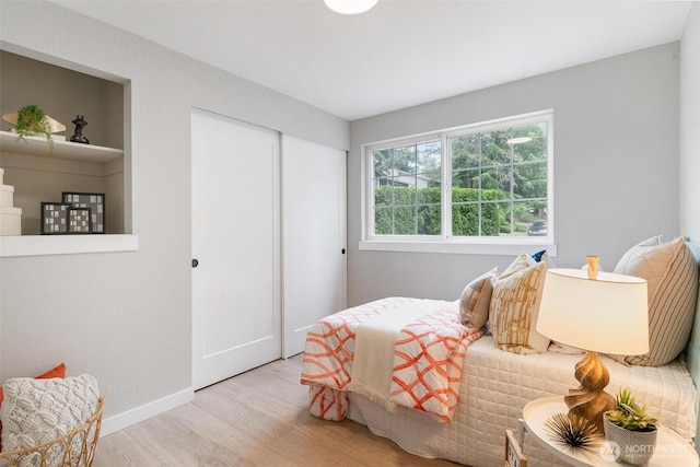 12804 NE 139th Ct, Kirkland, WA 98034 - bedroom with wood finished floors and a closet