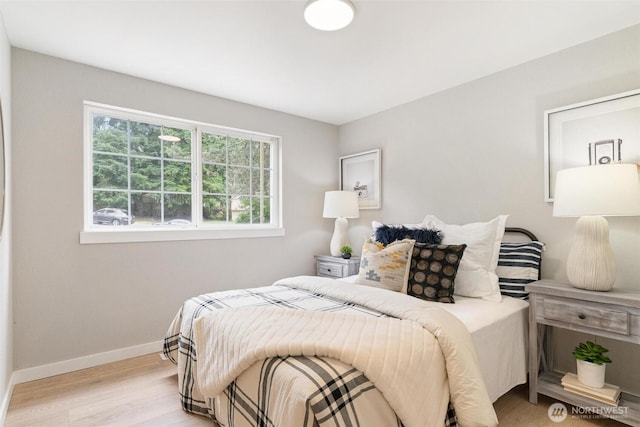 12804 NE 139th Ct, Kirkland, WA 98034 - bedroom featuring light wood finished floors and baseboards