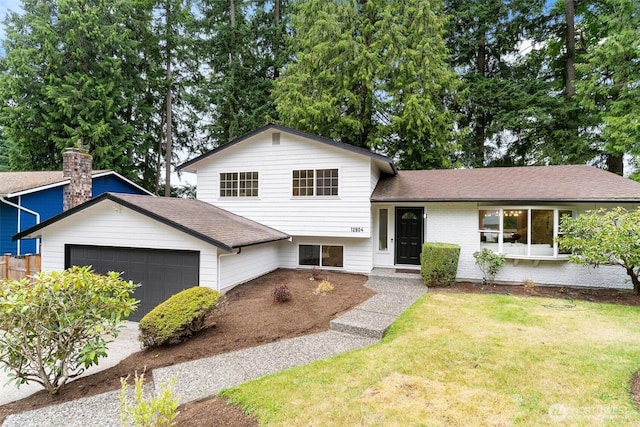 12804 NE 139th Ct, Kirkland, WA 98034 - split level home with a garage, a front lawn, and a shingled roof