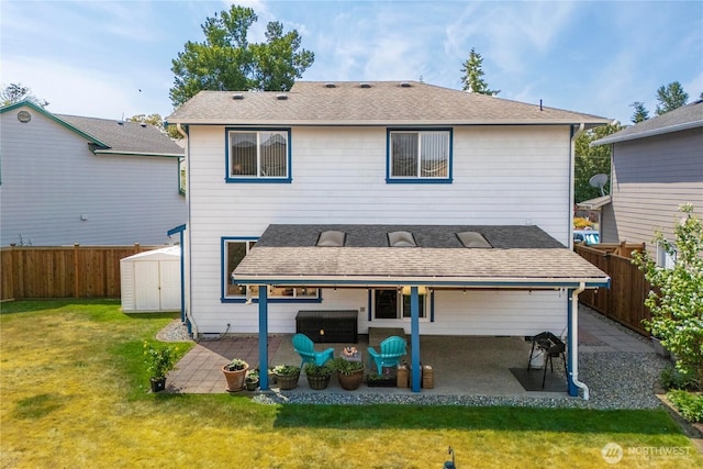 4517 35th St NE, Tacoma, WA 98422 - rear view of house with a patio area, a storage shed, and a fenced backyard