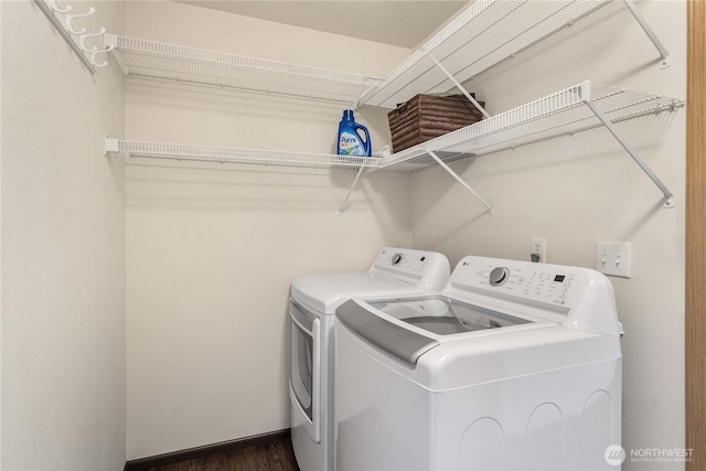 4517 35th St NE, Tacoma, WA 98422 - washroom featuring washing machine and dryer and dark wood-type flooring