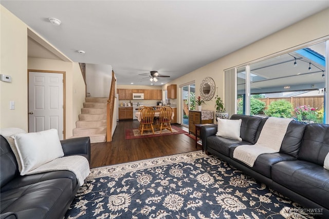 4517 35th St NE, Tacoma, WA 98422 - living room with dark wood-style flooring, stairs, and a ceiling fan