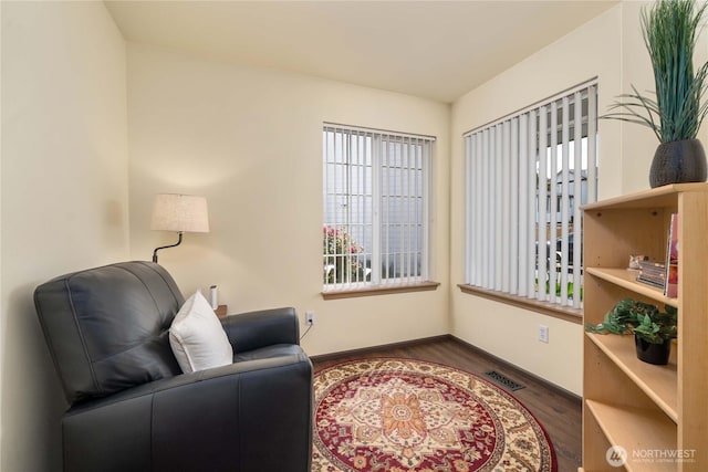 4517 35th St NE, Tacoma, WA 98422 - living area featuring baseboards and wood finished floors