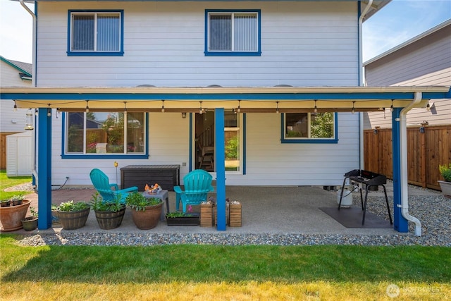 4517 35th St NE, Tacoma, WA 98422 - rear view of property featuring a patio and a shed