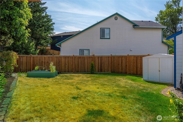 4517 35th St NE, Tacoma, WA 98422 - fenced backyard with a shed and a garden