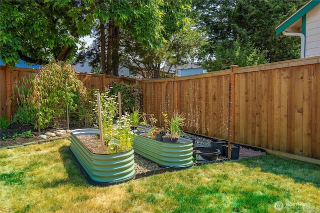 4517 35th St NE, Tacoma, WA 98422 - fenced backyard featuring a vegetable garden