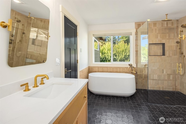 8411 202nd St SW, Edmonds, WA 98026 - full bathroom with a stall shower, vanity, a freestanding tub, and a wainscoted wall