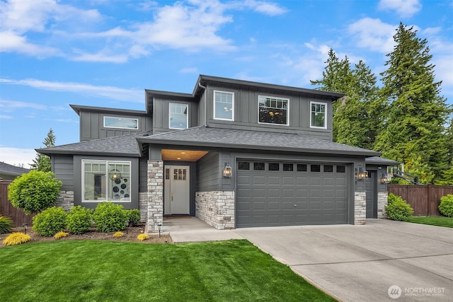 8411 202nd St SW, Edmonds, WA 98026 - prairie-style home with an attached garage, stone siding, driveway, and board and batten siding