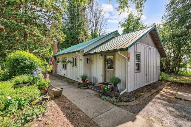3381 Centralia Alpha Rd, Onalaska, WA 98570 - view of front of house featuring a standing seam roof, a metal roof, and board and batten siding