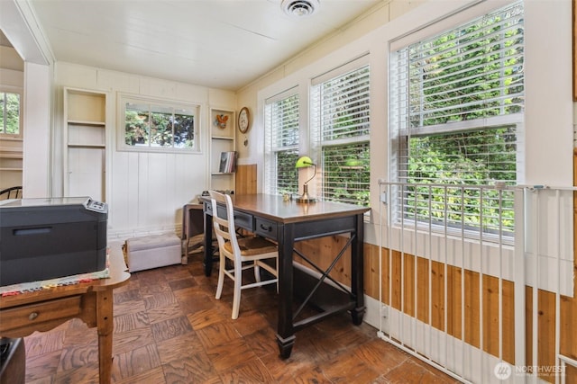 3381 Centralia Alpha Rd, Onalaska, WA 98570 - home office with wooden walls and plenty of natural light