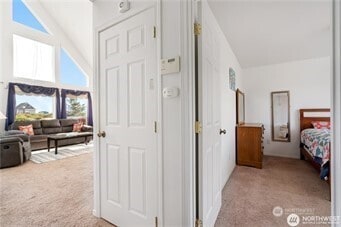 416 S Bel Air Loop SW, Ocean Shores, WA 98569 - carpeted bedroom with high vaulted ceiling