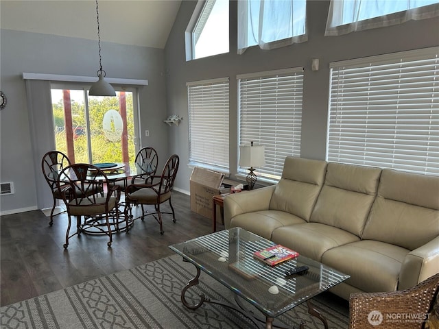 416 S Bel Air Loop SW, Ocean Shores, WA 98569 - living room featuring high vaulted ceiling and wood finished floors